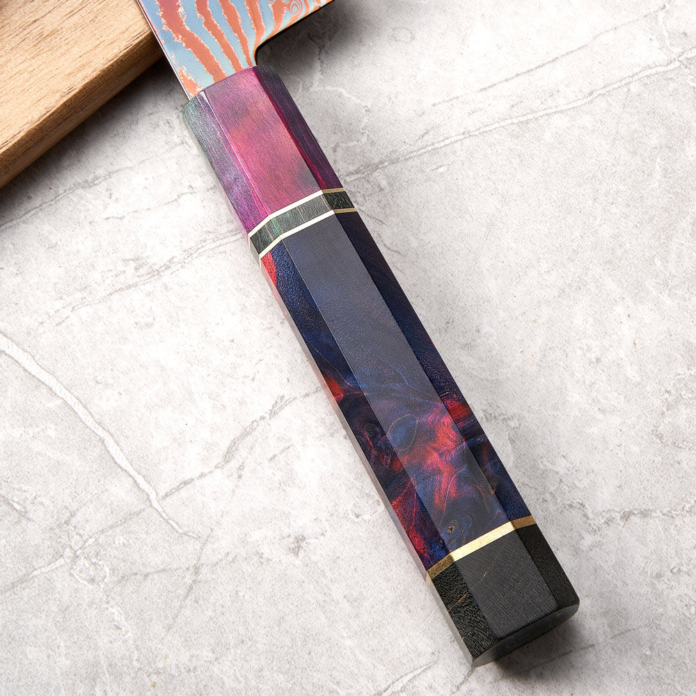 Colorful handle of a tool on a gray surface